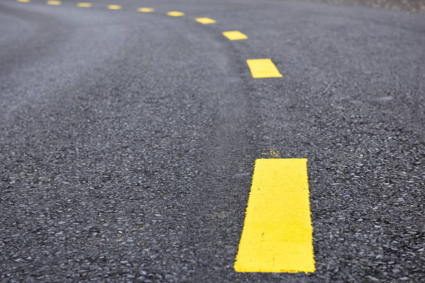 istock Asphalt road with yellow line on road 1019389490