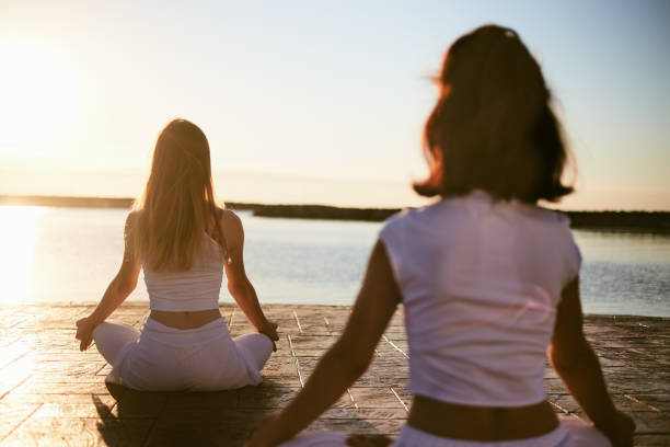 istock yoga asana on the Beach 1019389698