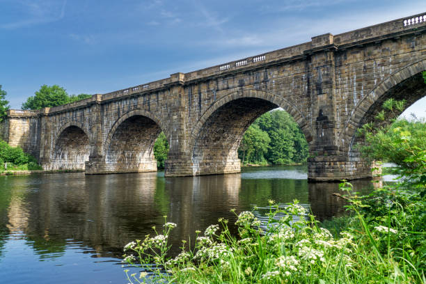 The Lune valley aqueduct, which carries the Lancaster canal over The Lune valley aqueduct, a magnificent Victorian engineering achievement, which carries the Lancaster canal over the river Lune. lancashire stock pictures, royalty-free photos & images