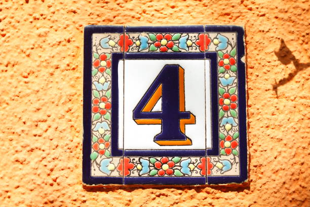 istock House number plate number four 1019396944
