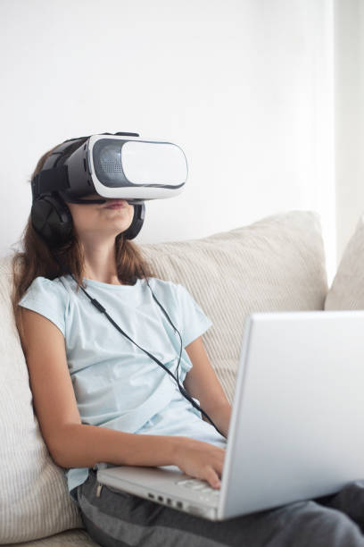 istock Girl having fun with VR headset 1019399776