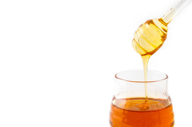 istock Honey jar with glass dipper 1019402980