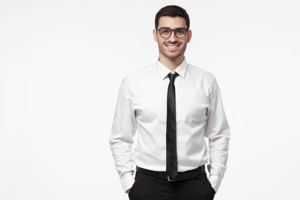 istock Young contemporary intelligent executive business man isolated on grey background. Copy space for your advertising text on the left side of picture. 1019406474