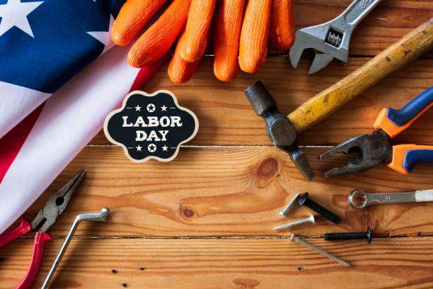 istock USA Labor day concept, First Monday in September. Different kinds on wrenches, handy tools, America flag and wooden tag on wooden table. 1019412324
