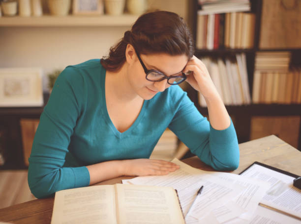 istock young woman working at home (literature) 1019413524