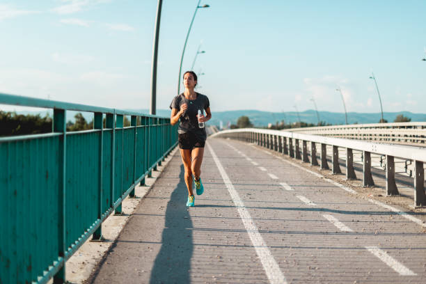 istock Healthy young woman on morning run 1019421546