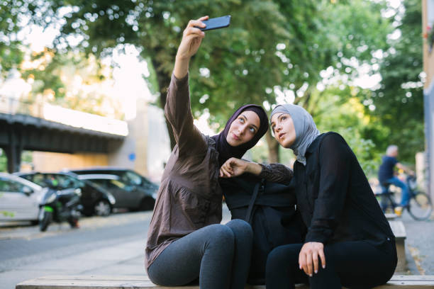 istock Two young woman taking a selfie. 1019427072