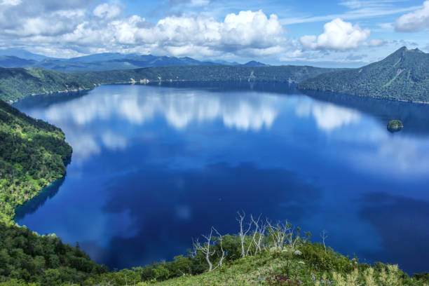Lake Mashu of blue Akan National Park (Akan Kokuritsu Koen) is located in eastern Hokkaido,Japan. national park akan stock pictures, royalty-free photos & images
