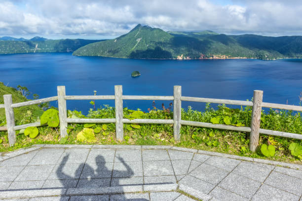 Lake Mashu of blue Akan National Park (Akan Kokuritsu Koen) is located in eastern Hokkaido,Japan. national park akan stock pictures, royalty-free photos & images