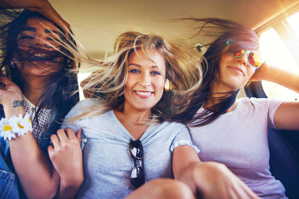 istock Girlfriends travelling with the wind in their hair 1019427312