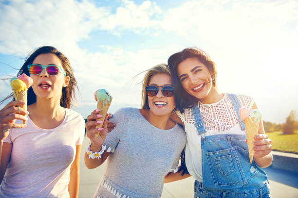 istock Three girlfriends enjoying a summer treat 1019427324