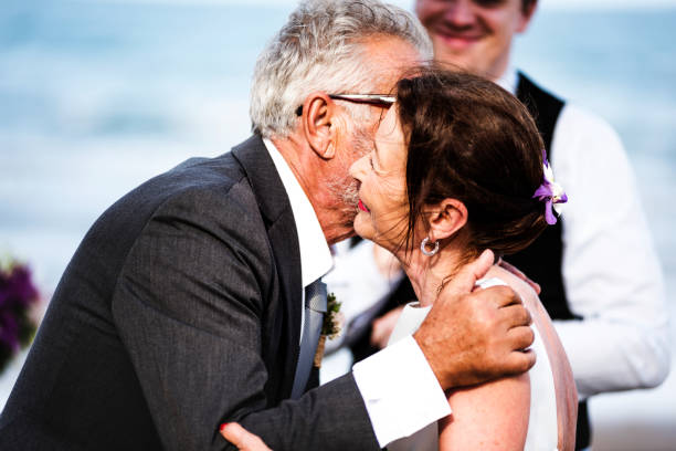 istock Senior couple getting married at the beach 1019434970
