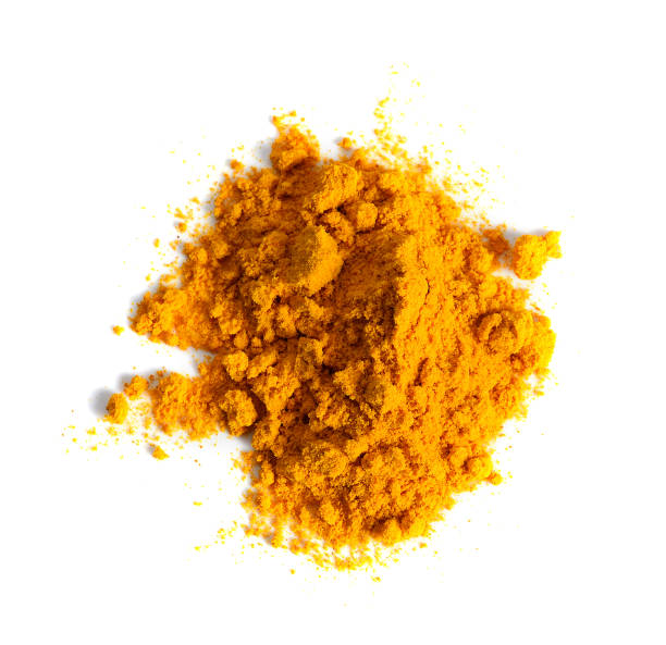 istock Turmeric (Curcuma) powder pile isolated on white background, top view. 1019441334