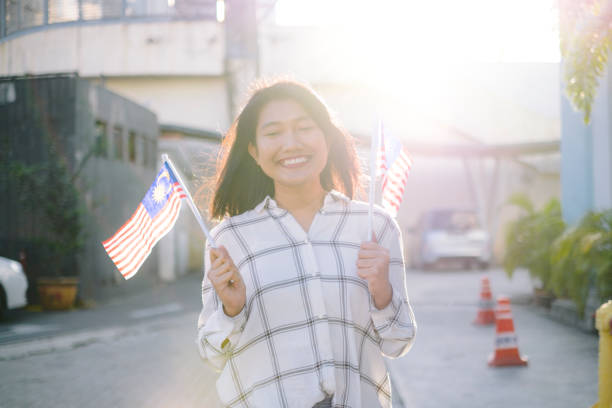 istock Women celebrate Malaysia Independence Day 1019444256