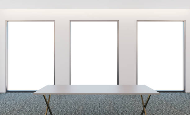 istock Front view of an office interior with a row of dark wood tables. 3D rendering. 1019444554