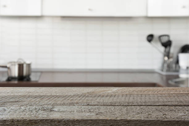 istock Blurred background. Modern defocused pastel kitchen with tabletop and space for you design. 1019445626