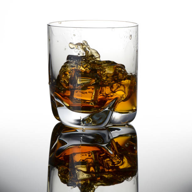 istock whiskey glass with ice 1019463812