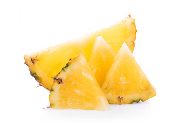 istock pineapple with slices isolated on white background 1019474934