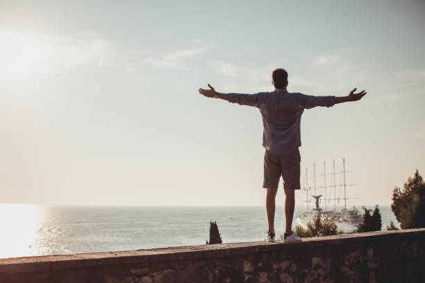 istock Guy loving the sea 1019480670