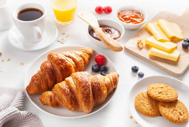 istock Continental breakfast with croissant,  jam, chocolate spread and coffee 1019485726