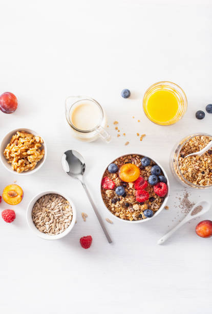 istock healthy granola for breakfast with berry fruit nut, vegan milk 1019487972