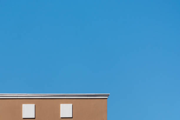 istock Top of a building in a blue sky 1019499574