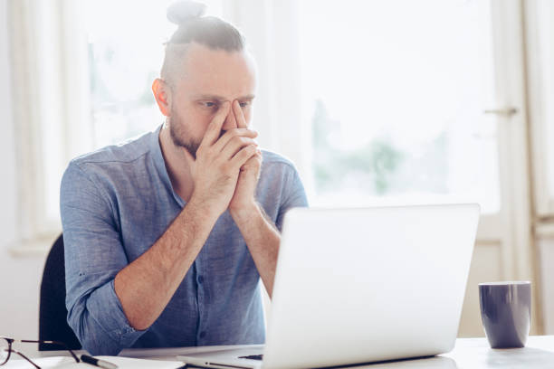 istock Young businessman working on laptop. 1019500378