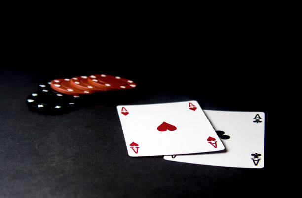 istock Poker cards and chips isolated on black. 1019513688