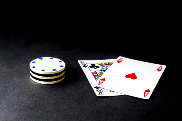istock Poker cards and chips isolated over black. 1019513954