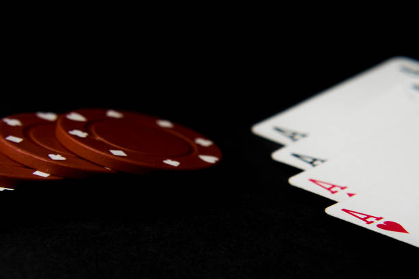 istock Poker cards and chips isolated on black. 1019513964