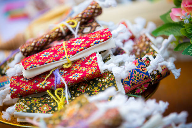 Colorful of wallet wedding souvenir, made from thai fabric pattern
