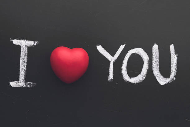 istock I Love You. Handwritten message on a chalkboard 1019523752