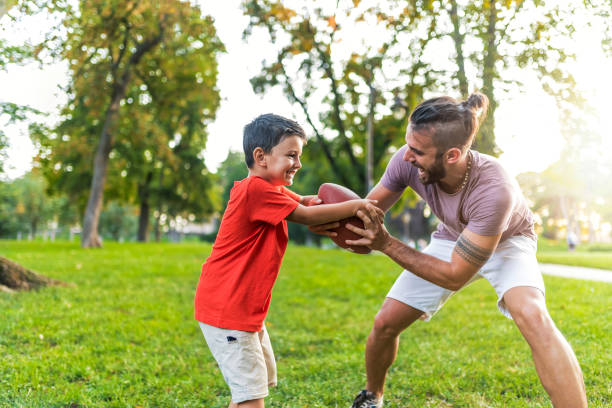 istock American football with my dad 1019548450