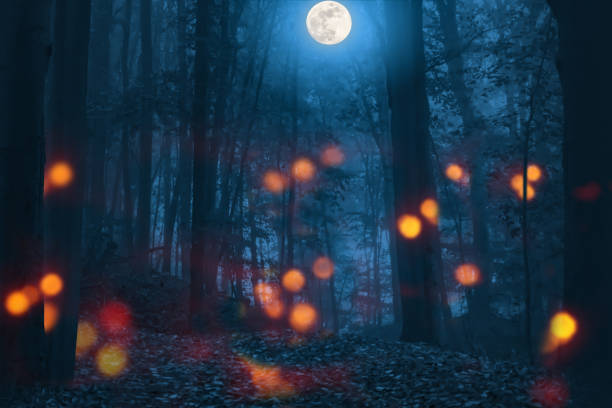 istock ghosties in the forest halloween background 1019556940