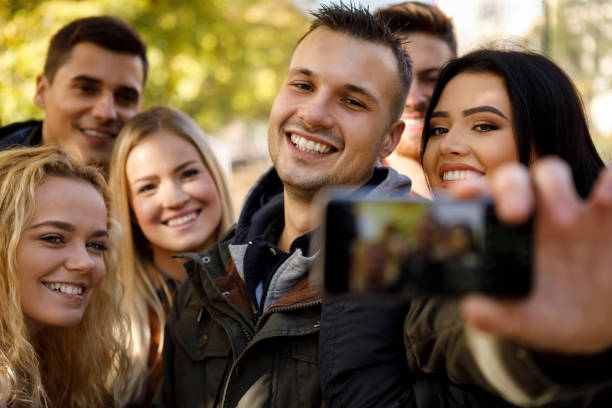 istock Group of friends making selfie 1019565126