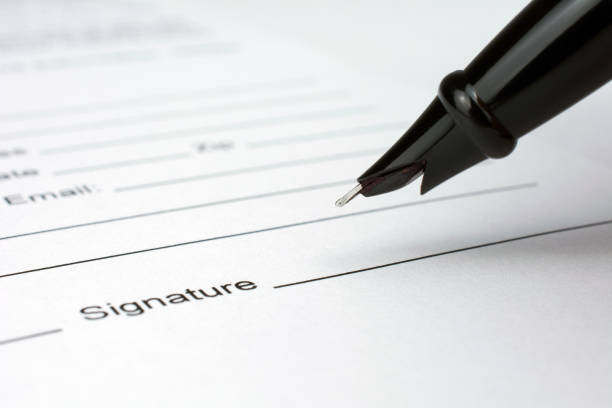istock put a signature on an contract waiting to be signed 1019568994