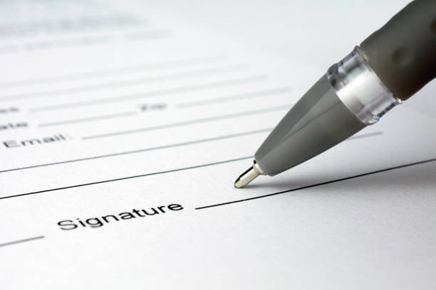 istock put a signature on an contract waiting to be signed 1019569066
