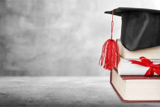 Scroll. Graduation cap with books and Degree masters degree photos stock pictures, royalty-free photos & images