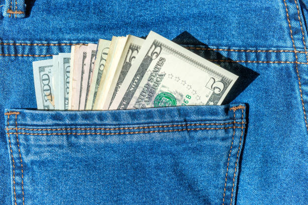 istock Batch of money in blue jeans pocket 1019575666