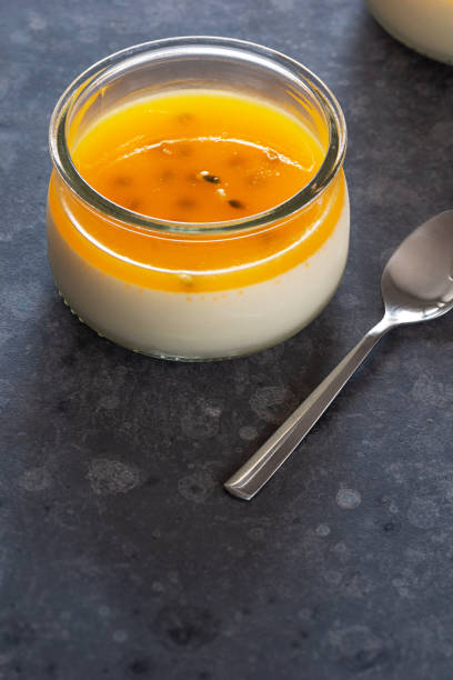 istock Tropical Passionfruit Panna Cotta, a Creamy Pudding with Layer of Passionfruit Gelatin 1019575804
