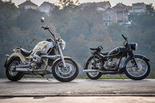 BMW motorbike old vs. new, classic vs modern, street style. Image made in Serbia with idea to compare same model of the motorbike from past century and newer age. Photo was made in november 2015 and on the photo is very rare classic BMW motorbike. Idea was to present design and concept from the past comparing to modern motorbike today.