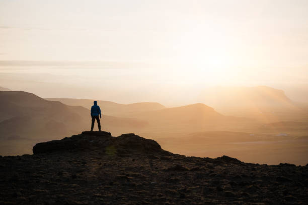istock Tourist at sunrise in the mountains 1019597418