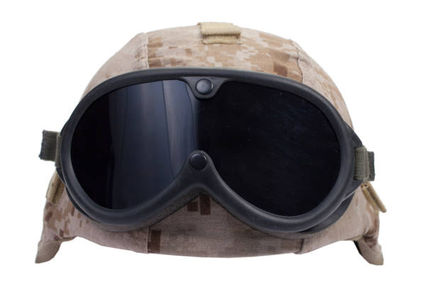 istock us marines kevlar helmet with desert camouflage cover and protective goggles 1019606592