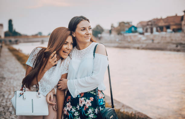 istock Two happy woman friends laughing 1019616194