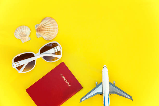 istock Concept of traveling on yellow background 1019626276