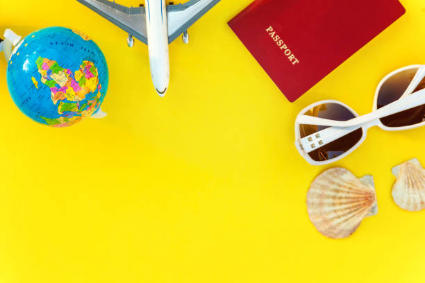istock Concept of traveling on yellow background 1019626322