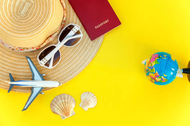 istock Concept of traveling on yellow background 1019628588