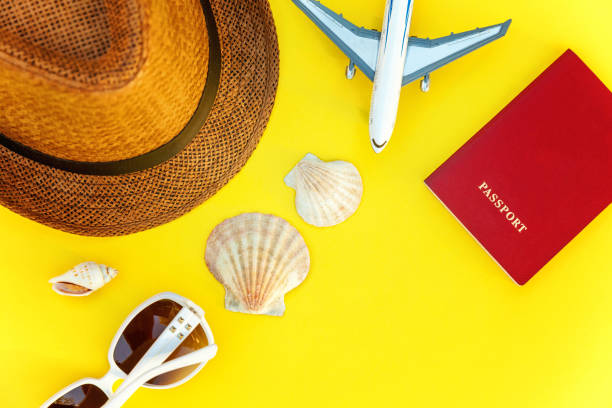 istock Concept of traveling on yellow background 1019628654