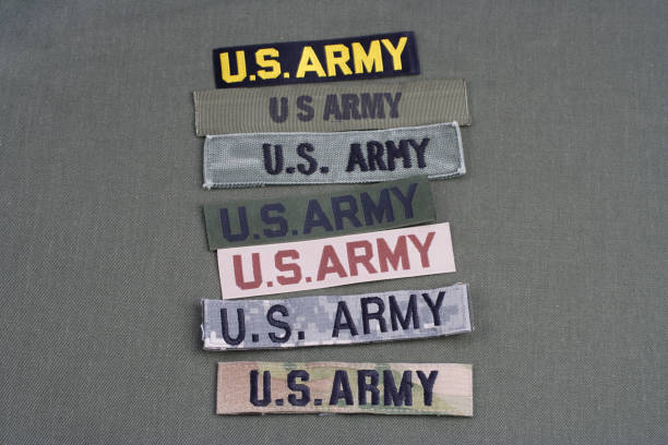 istock US military concept on olive green uniform background 1019629804
