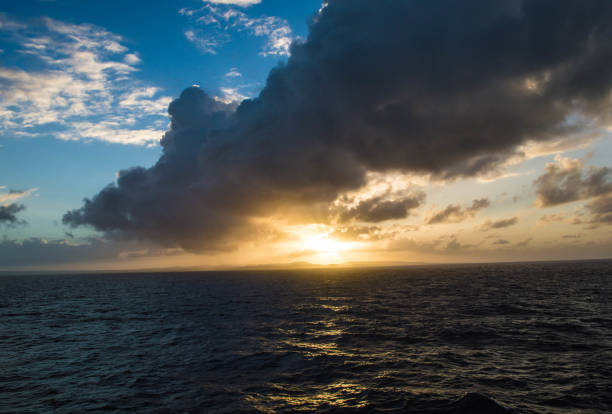 istock Stormy sunset skies over the ocean 1019635556